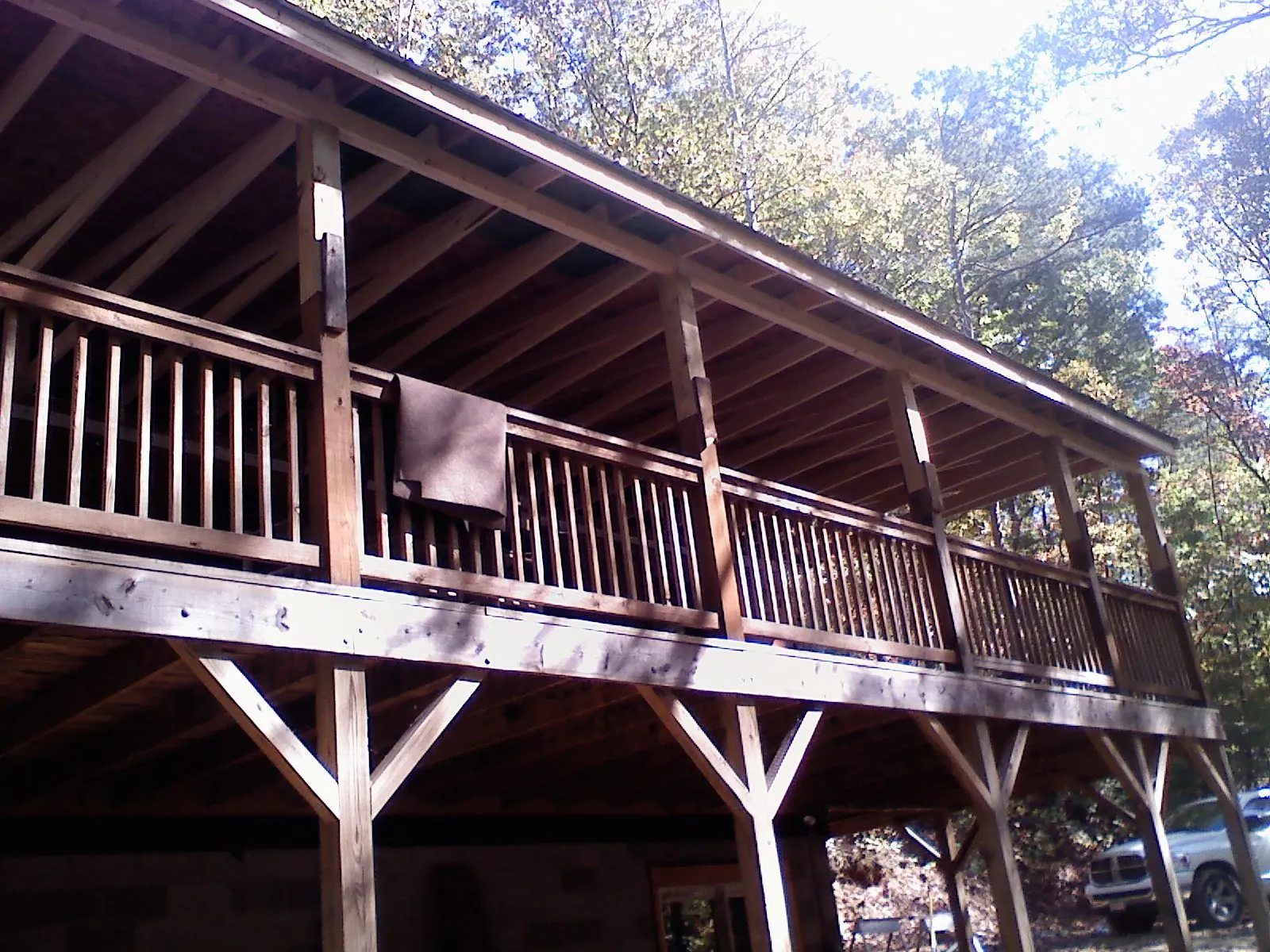 Timber framing under a new elevated porch and deck — Roof Leak Repair in Topsham by Roofing Brothers